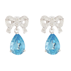 Ladies Sterling Silver .10 cttw Diamond Bow and Blue Topaz Dangle Earrings